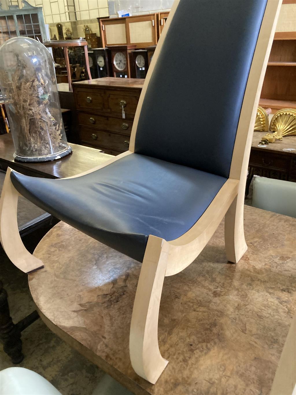 A pair of Bark furniture bespoke beech lounge chairs, one with arms. height 120cm, width 70cm, depth 90 cm